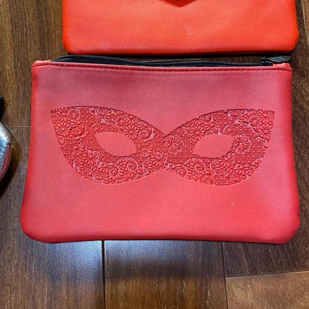 5 ipsy bags including spider web